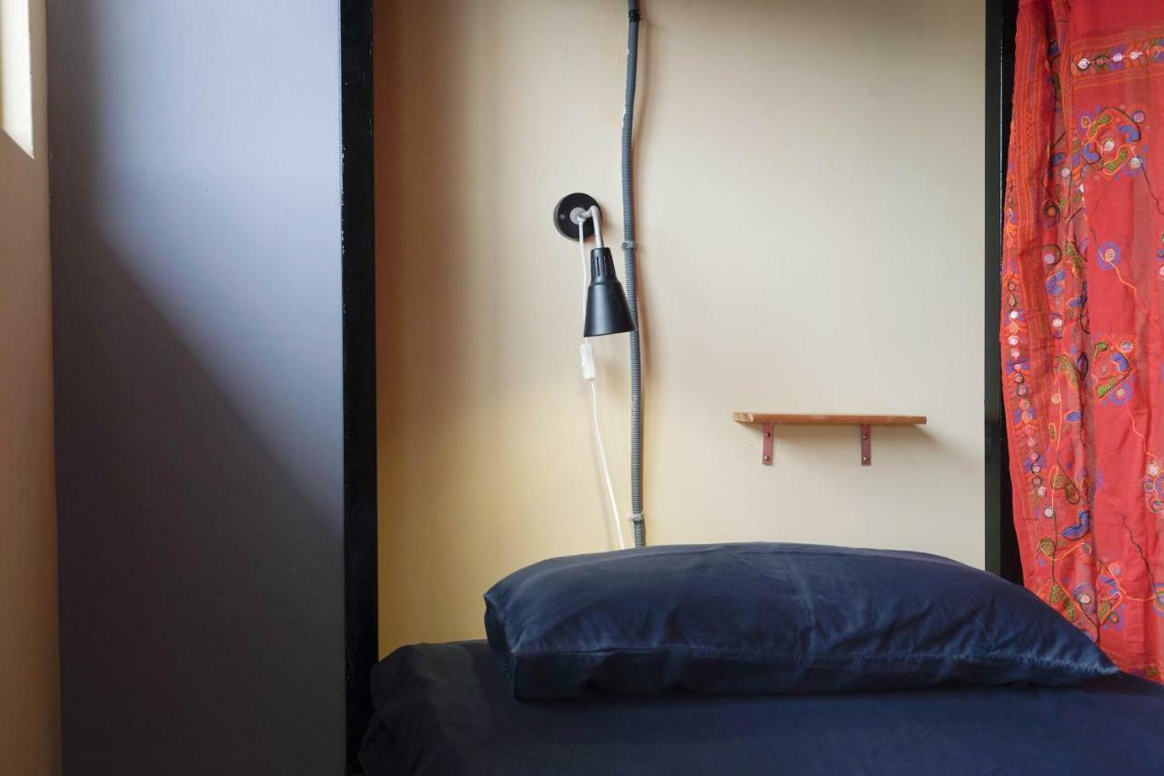 Dulan The Travel Bug Bistro Inn Donghe Eksteriør billede